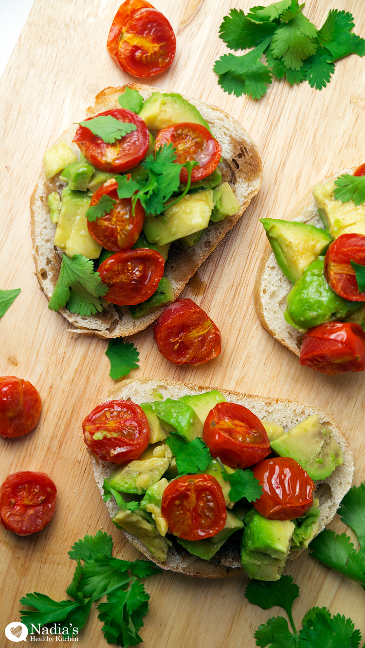 Smashed avo and tomatoes on sourdough - mindbodymeg