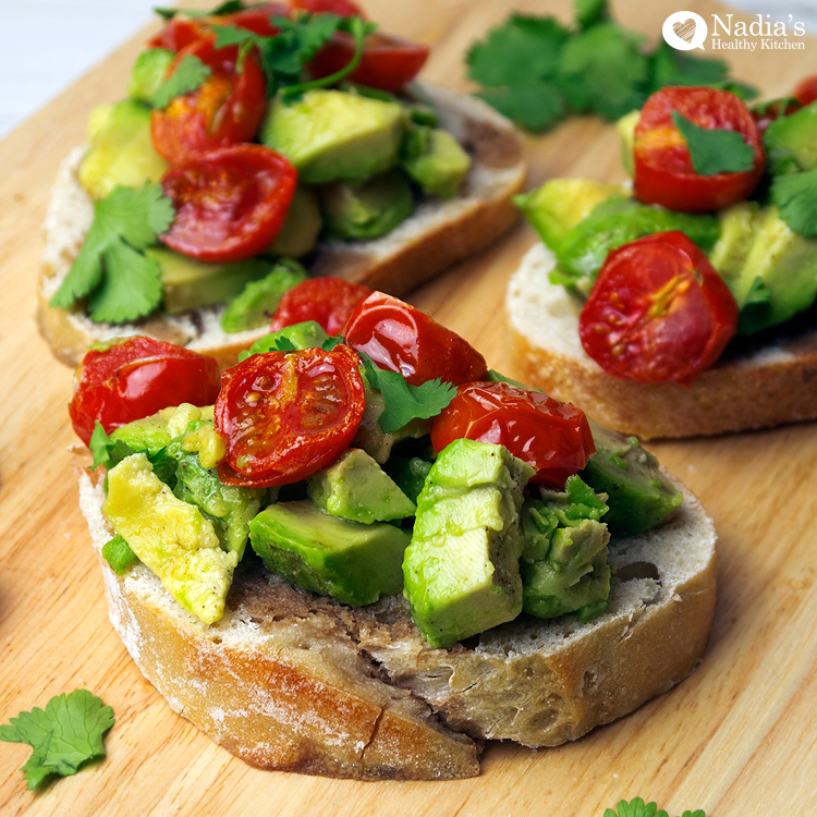 Smashed avo and tomatoes on sourdough - mindbodymeg