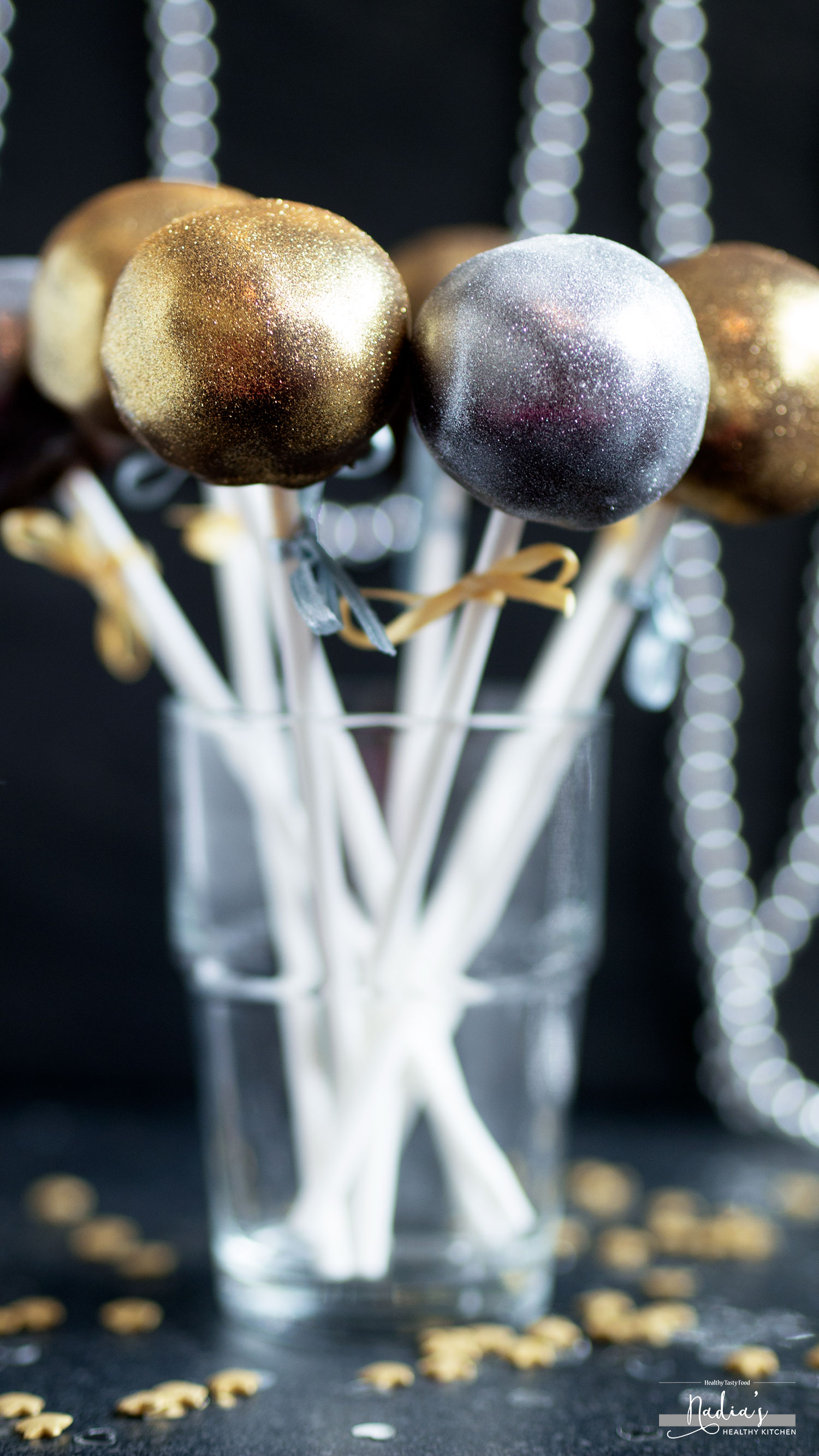 Row Of Peppermint Brownie Cake Pops Standing Gold Glitter Cups On White  Plate With Gold Ribbon Stock Photo, Picture and Royalty Free Image. Image  24121441.